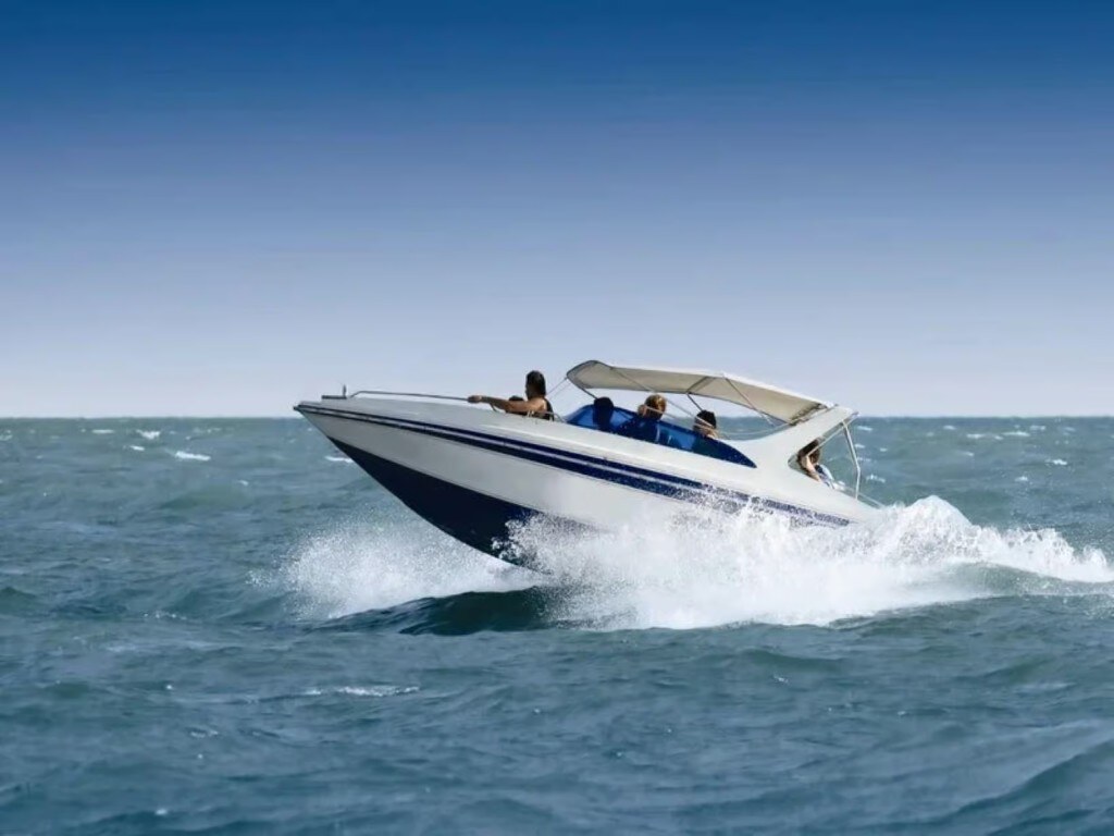 Speedboat cruising open sea