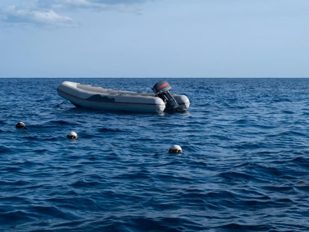 Empty RIB at mooring buoys