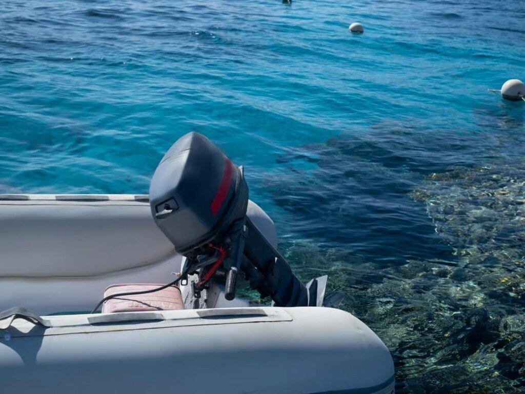 RIB stern over clear reef water