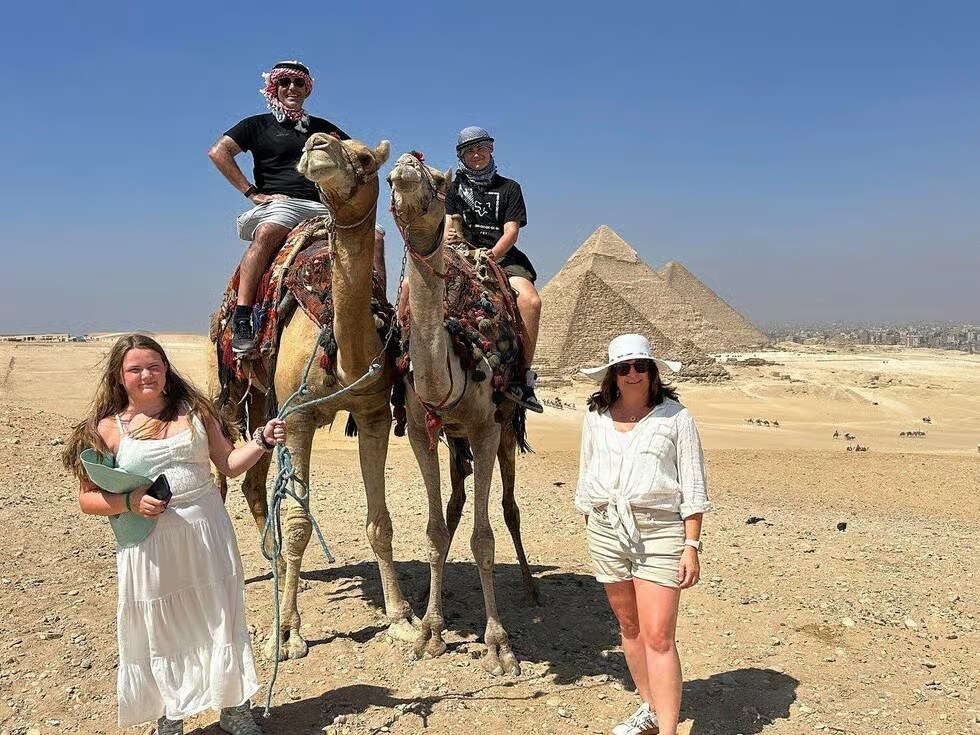Family camel ride at Giza